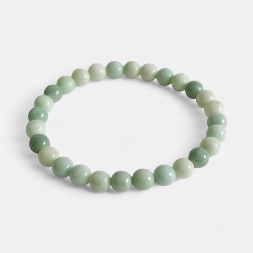 Crystal Harmony Bracelet - Lys Jade - 6 mm perler Gua-sha.dk